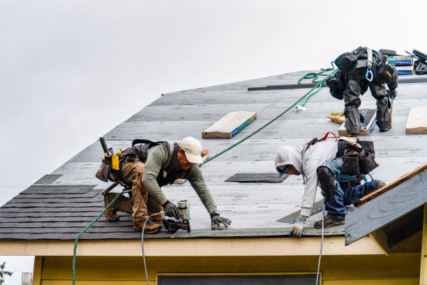 Professional Gutter Installation technician working in Kenmare, ND
